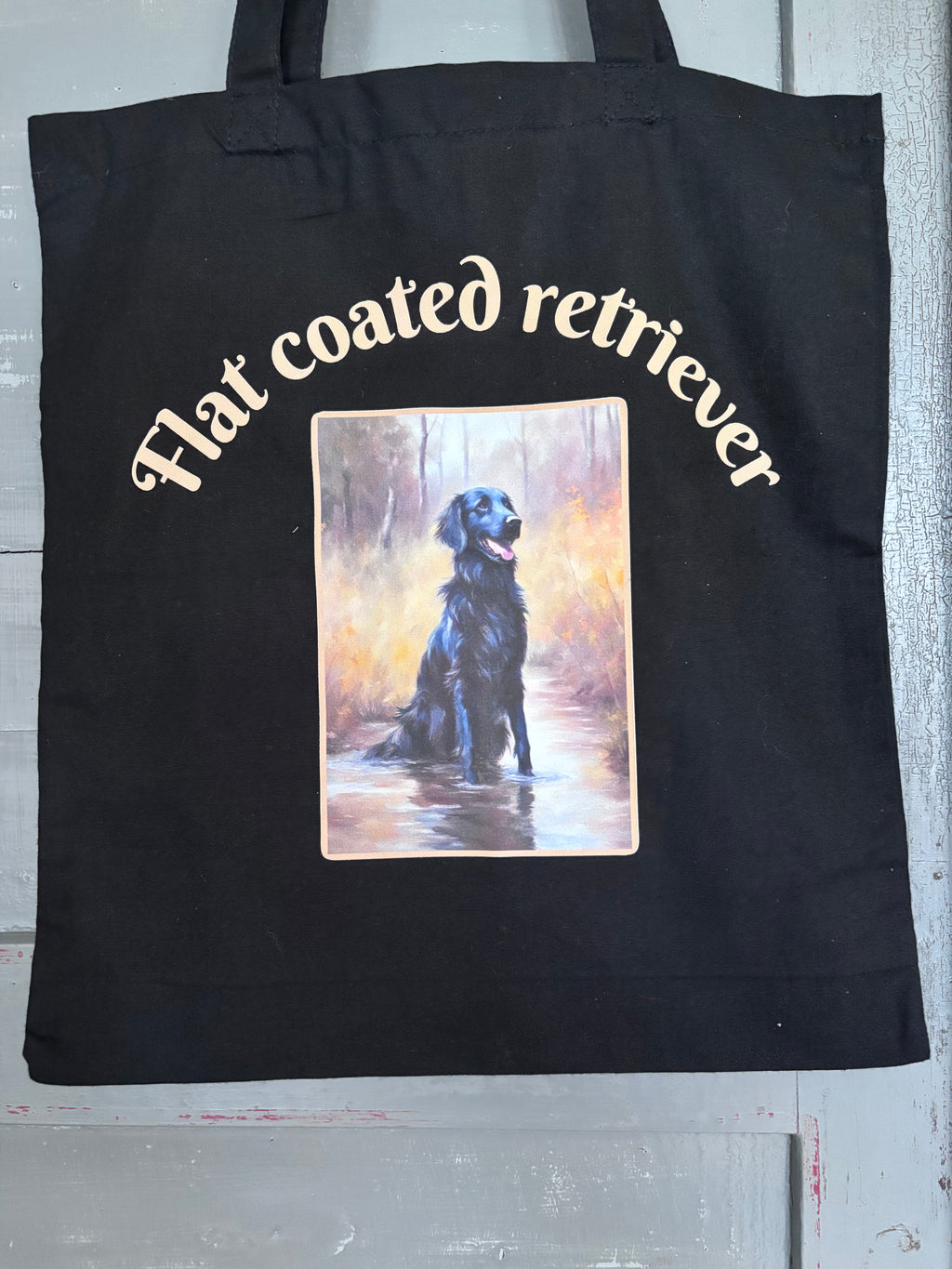 Handlenett sort med flat og tekst